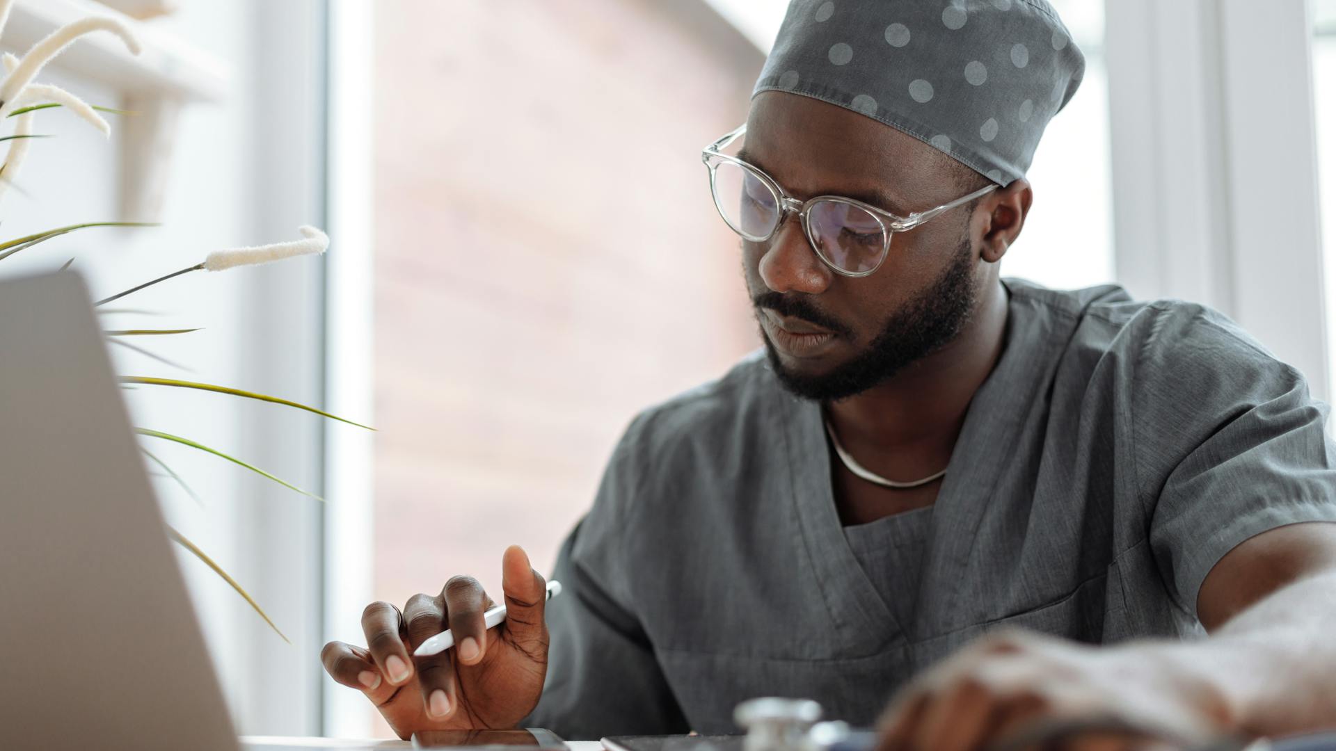 Healthcare professional reviewing patient records